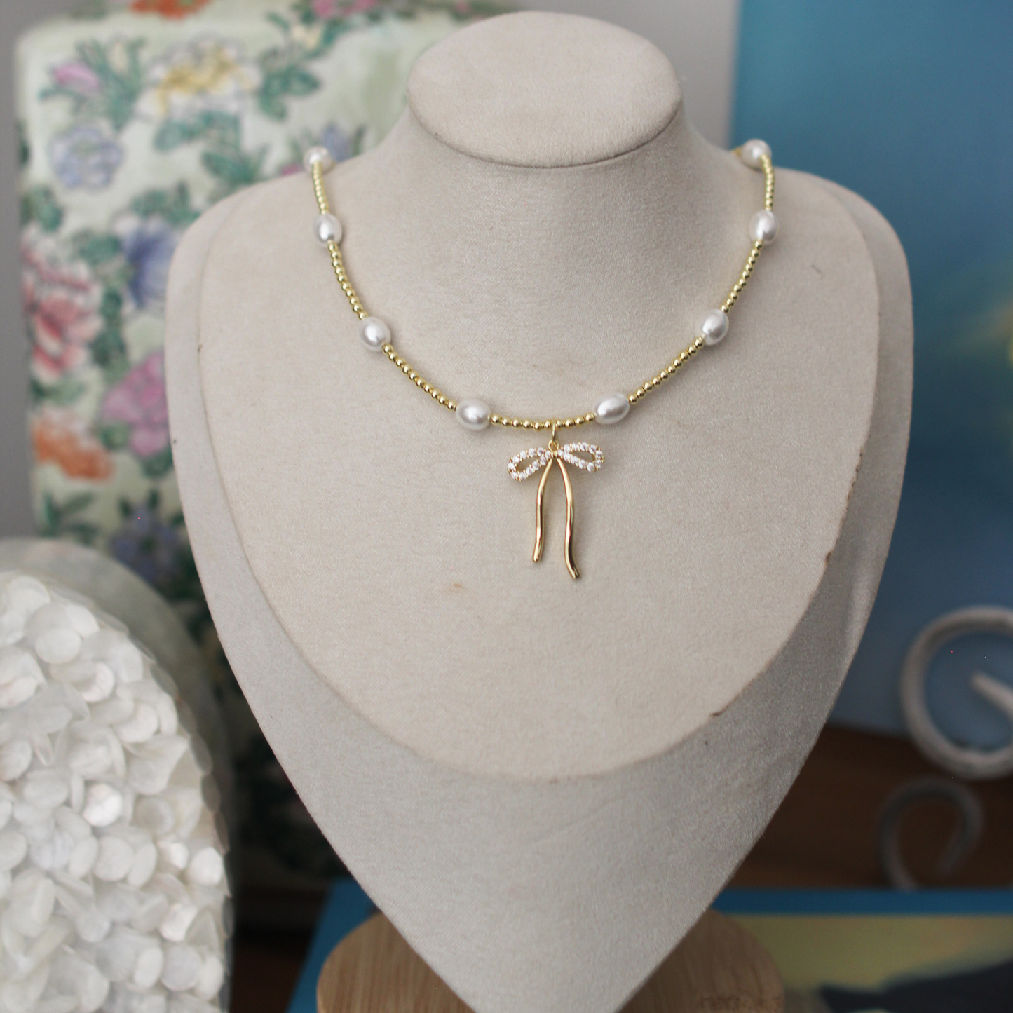 Gold Pearl Chain with Bow Charm